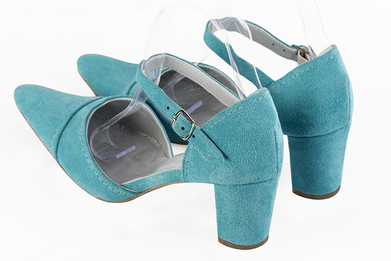 Aquamarine blue women's open side shoes, with an instep strap. Tapered toe. Medium block heels. Rear view - Florence KOOIJMAN